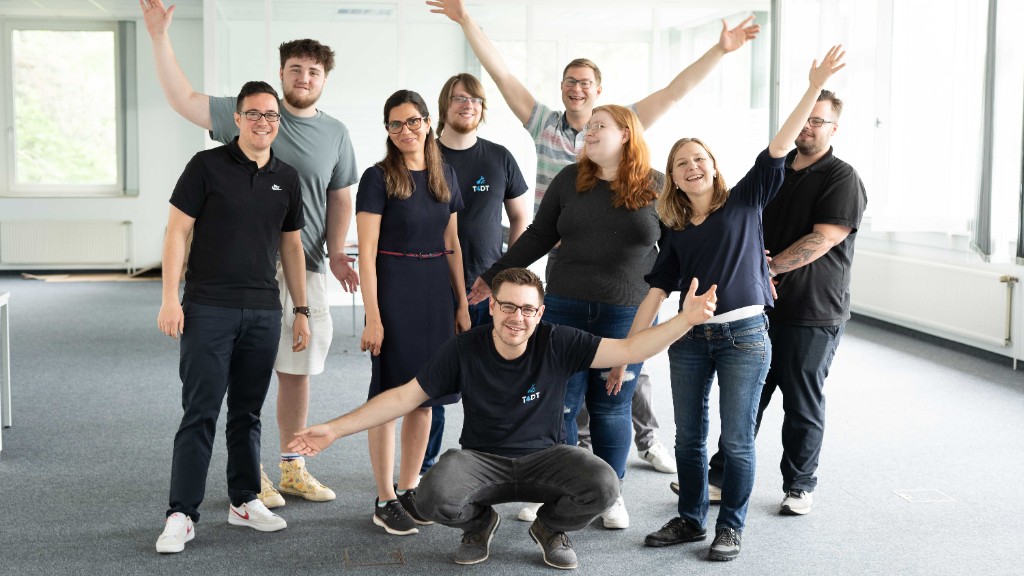 Teambild der T4DT GmbH im Büro